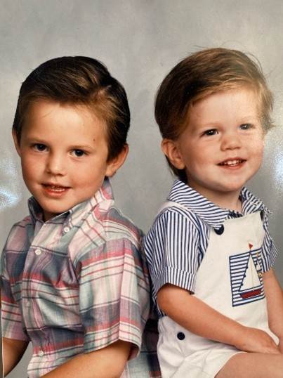 a photo of jim and steven crew as children