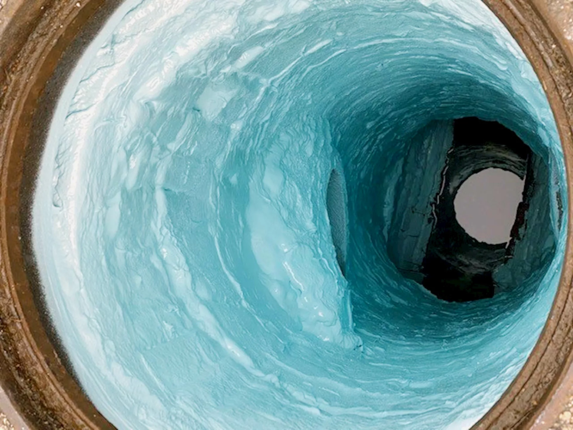 The contractor also sprayed an epoxy coating in the manholes during the rehabilitation of the Cook Street Sewer District's combined sewer system.
