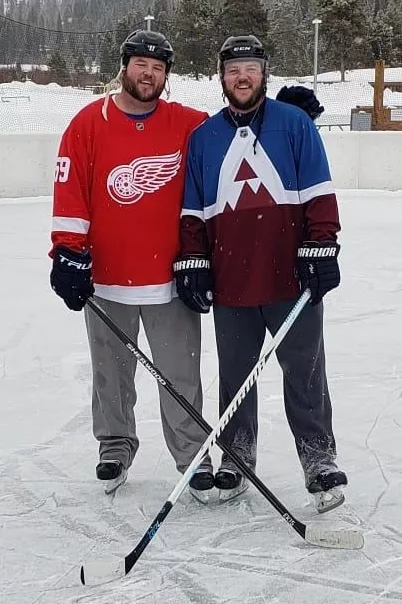 steve and jim playing hockey