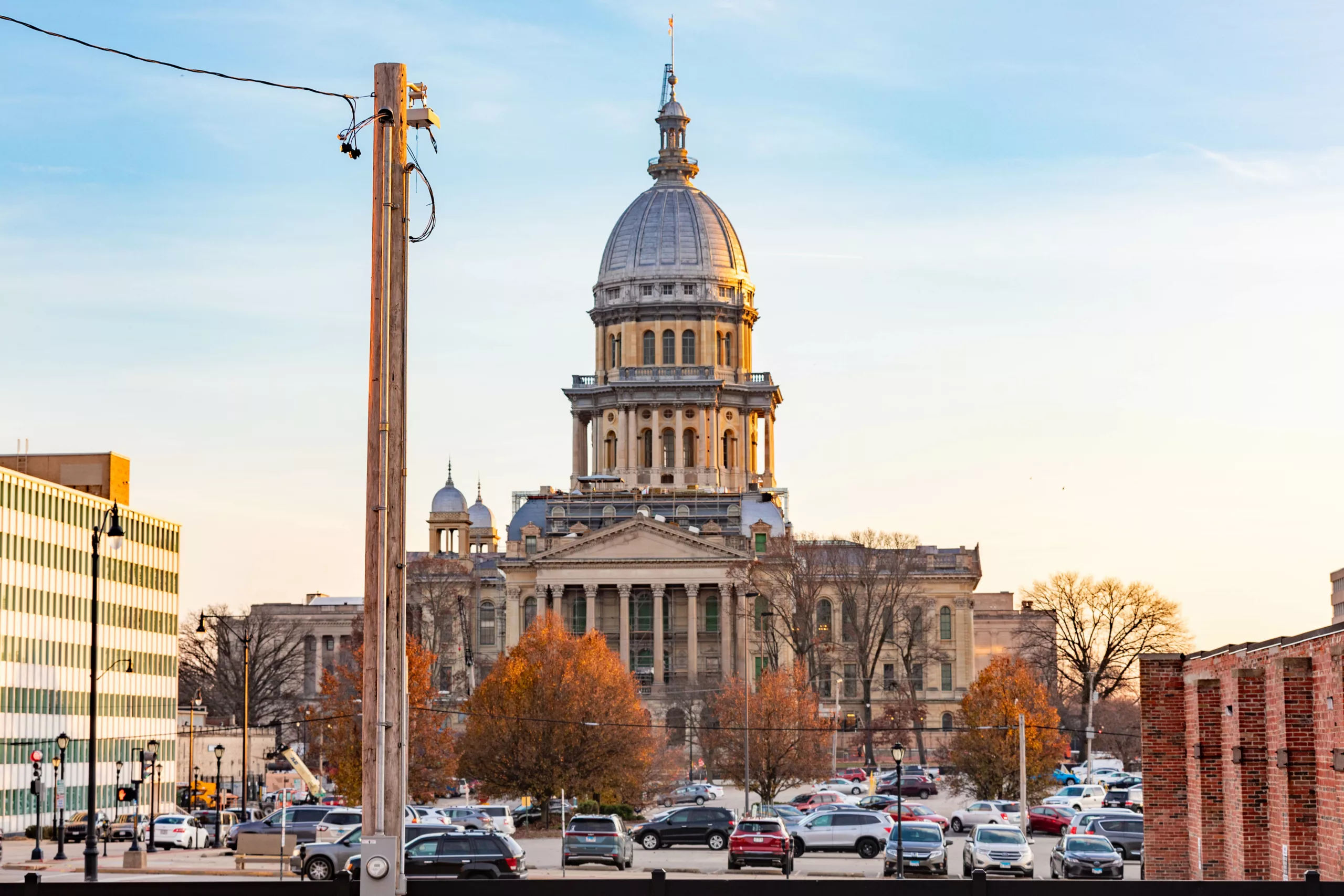 Power pole in foreground with Illinois State Capitol building in background
