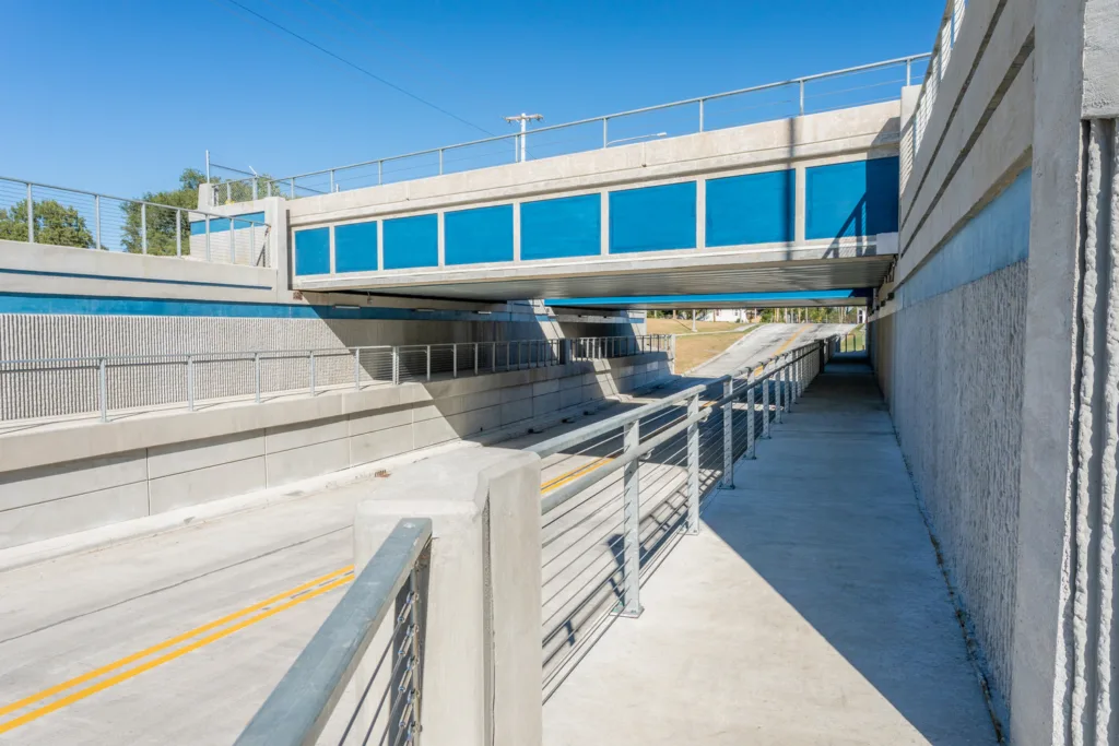 Close-up shot of sidewalk in front of completed Laurel Street underpass