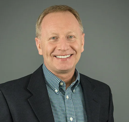 headshot of Mike Brand