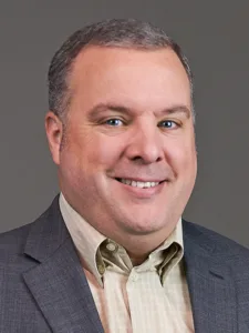 headshot of Andy Nicol