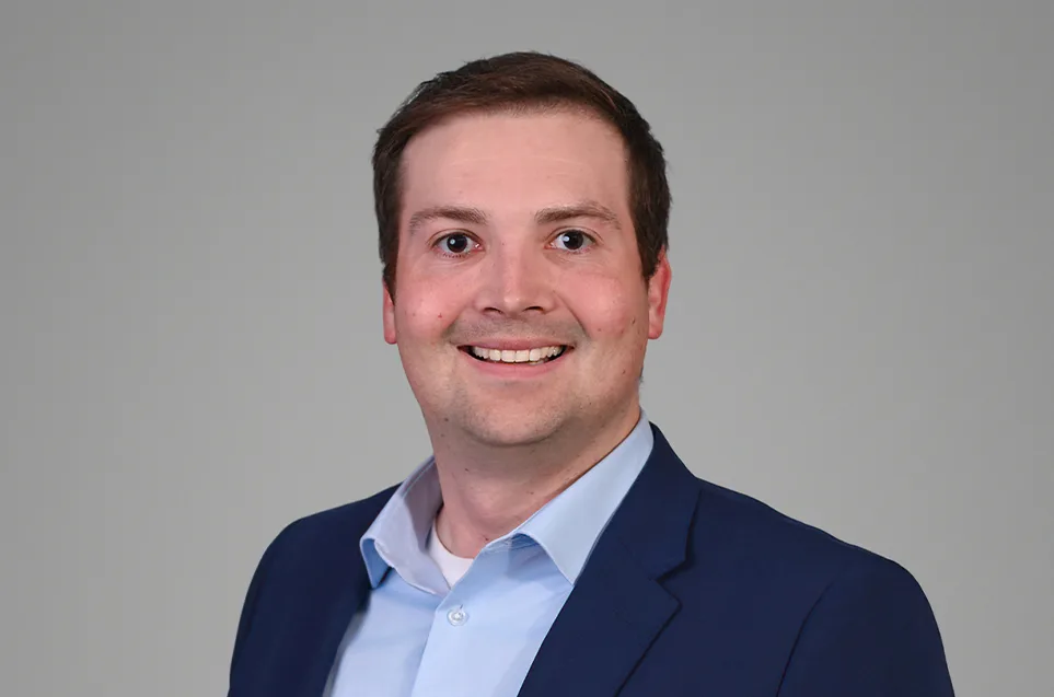 headshot of Tom Considine