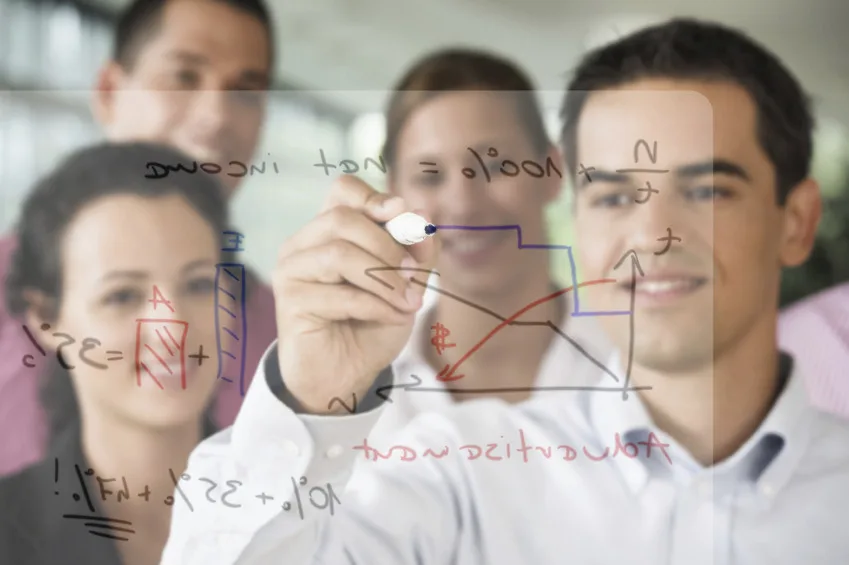 Contemporary business people working in team in the office