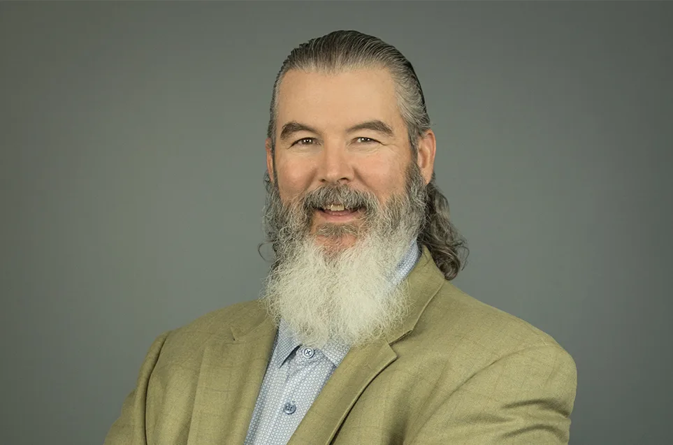 headshot of Ed Singer