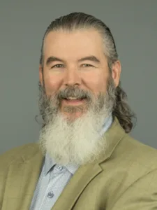 headshot of Ed Singer