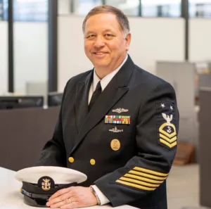Portrait of Daryl Davis in black military uniform with gold accents