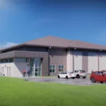 Rendering of military building surrounded by grass, blue sky in background and parked cars in lot in foreground