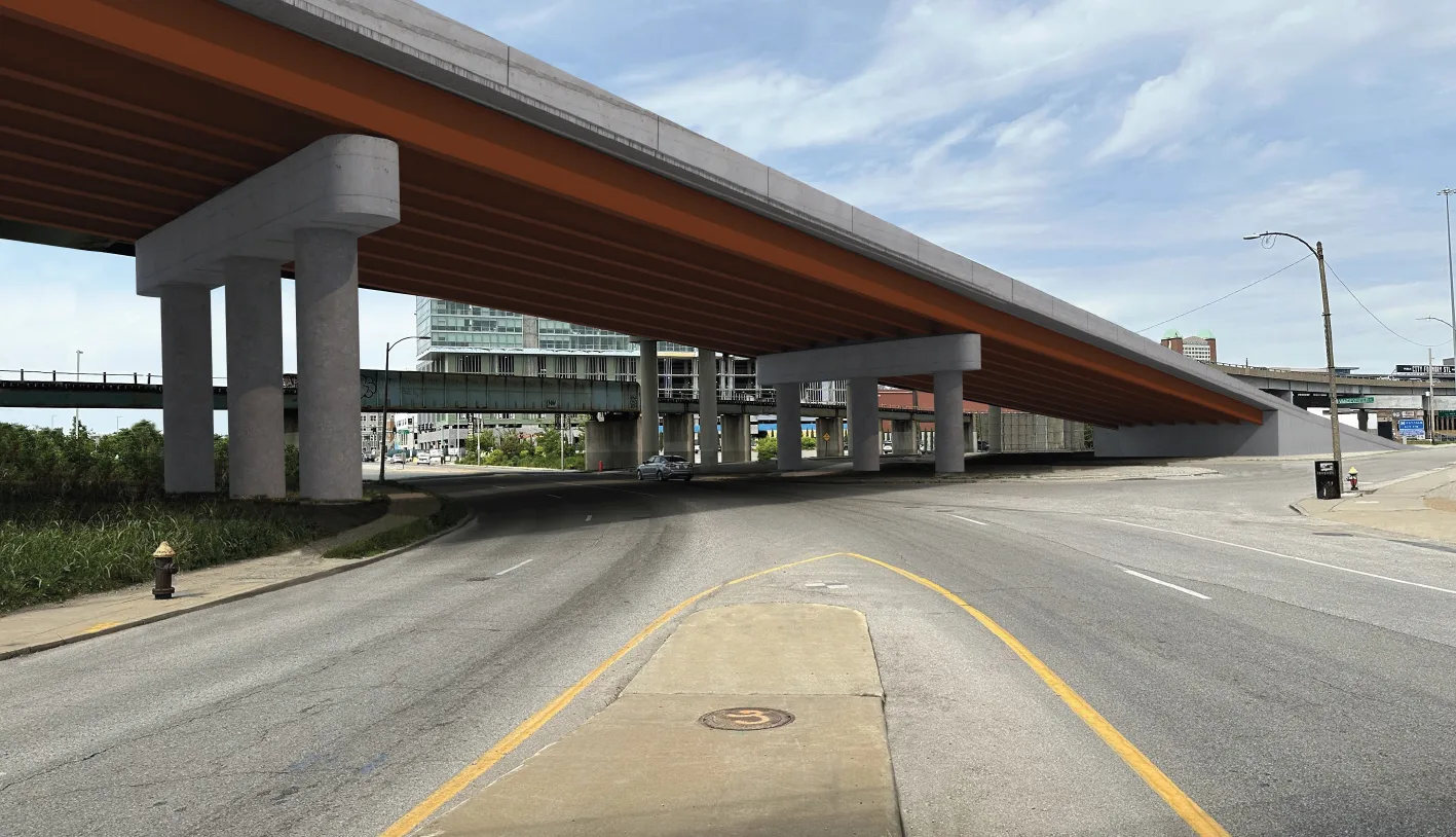 Rendering shows close-up of new bridge on highway with buildings and other bridges in background