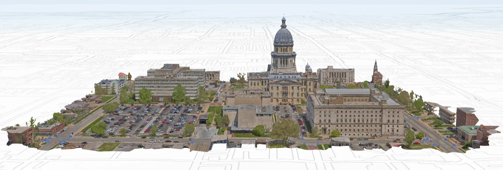 Rendering of downtown area with state capital building with dome towering above other buildings below