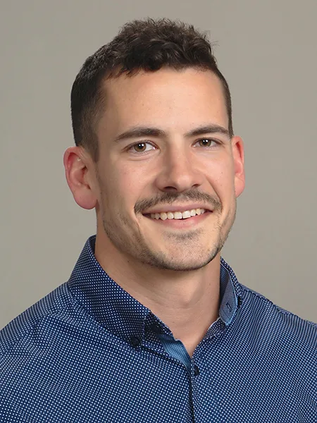headshot of Derek Betz